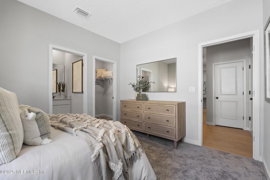 Furnished interior view inside a new home in The Cypress Series at Reserve East, Flagler Beach (Image 8).