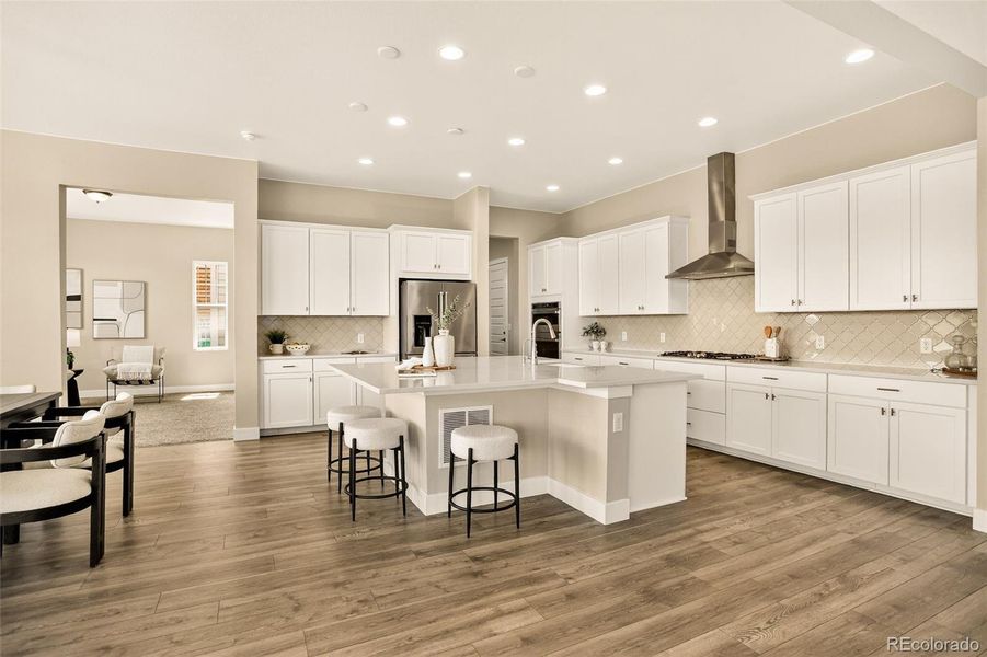 Clean lines with white cabinets and kitchen island Clean lines with white cabinets and kitchen island