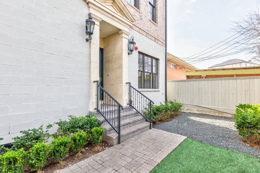 Exterior details and patio area of a home in Austin Modern Lofts at Mueller, Austin (Image 24).
