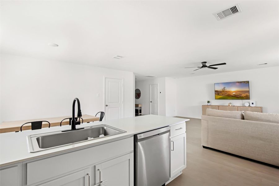 kitchen view to dining area and family room.