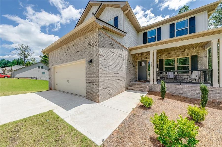 Front exterior of a new home in , Maysville, GA, highlighting curb appeal (Image 22).