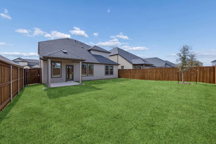 Covered Patio in the Masters home plan by Trophy Signature Homes – REPRESENTATIVE PHOTO