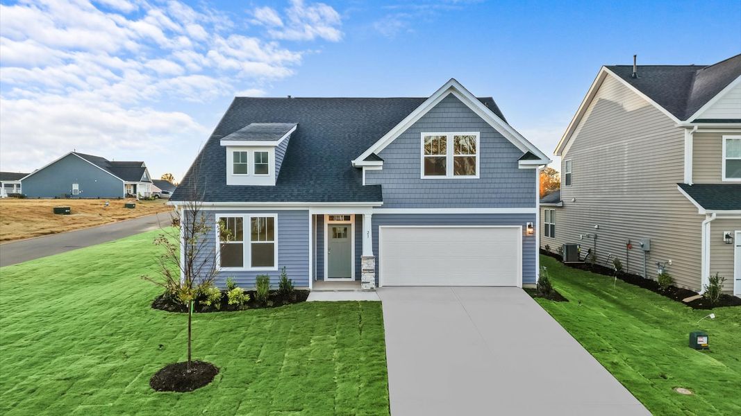 Notable street presence with tasteful elevation and thoughtful landscaping