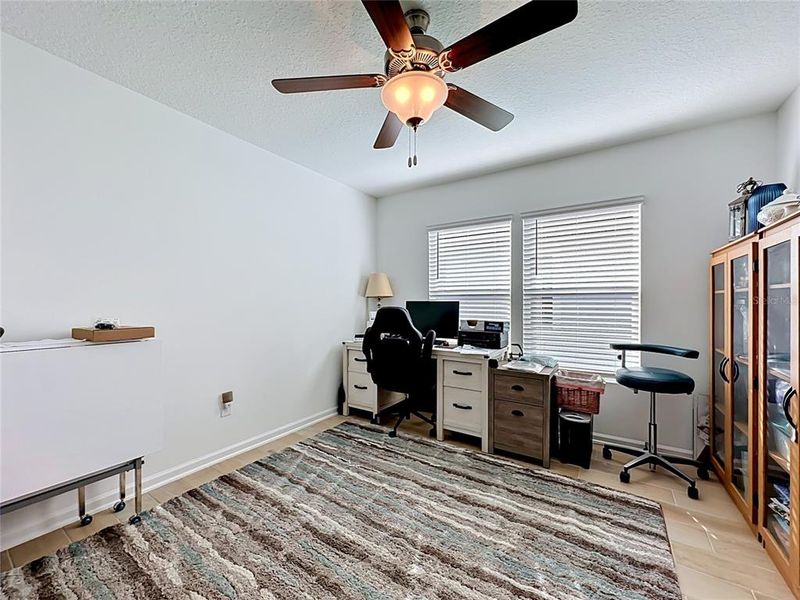 Furnished interior view inside a new home in Sawmill Branch Express, Palm Coast (Image 10).