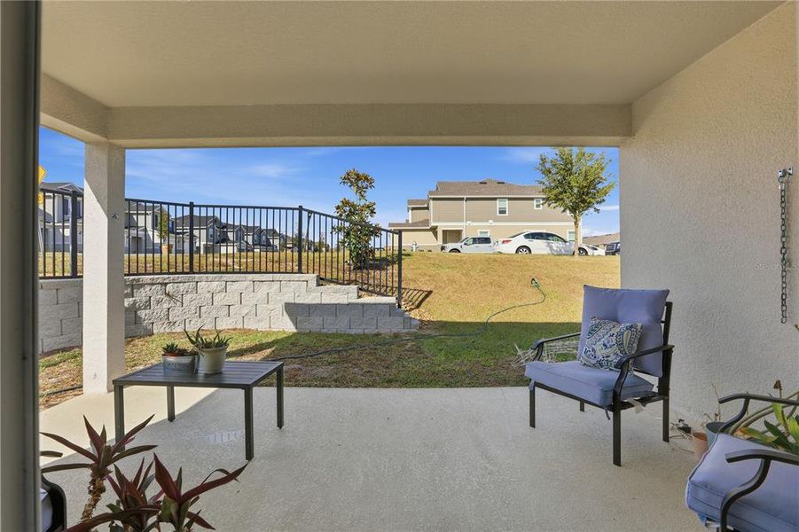 Exterior details and patio area of a home in Bellaviva I at Westside, Davenport (Image 3).