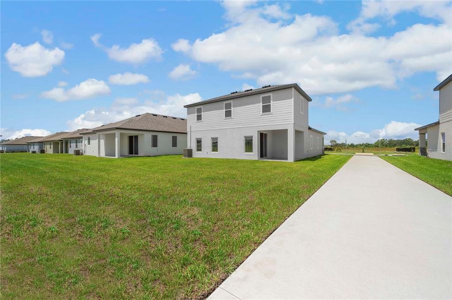 Exterior details and patio area of a home in Gum Lake Preserve, Lake Alfred (Image 2).