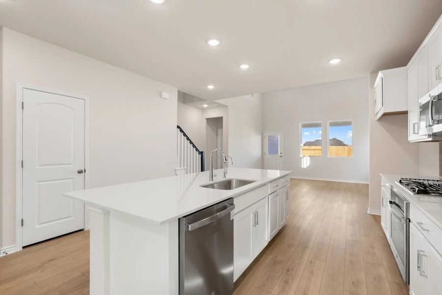 Furnished interior view inside a new home in Lariat, Liberty Hill (Image 13). Furnished interior view inside a new home in Lariat, Liberty Hill (Image 13).