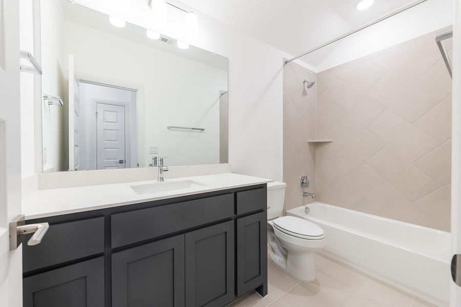 Furnished interior view inside a new home in The Hollows Canyon - 60', Lago Vista (Image 11).