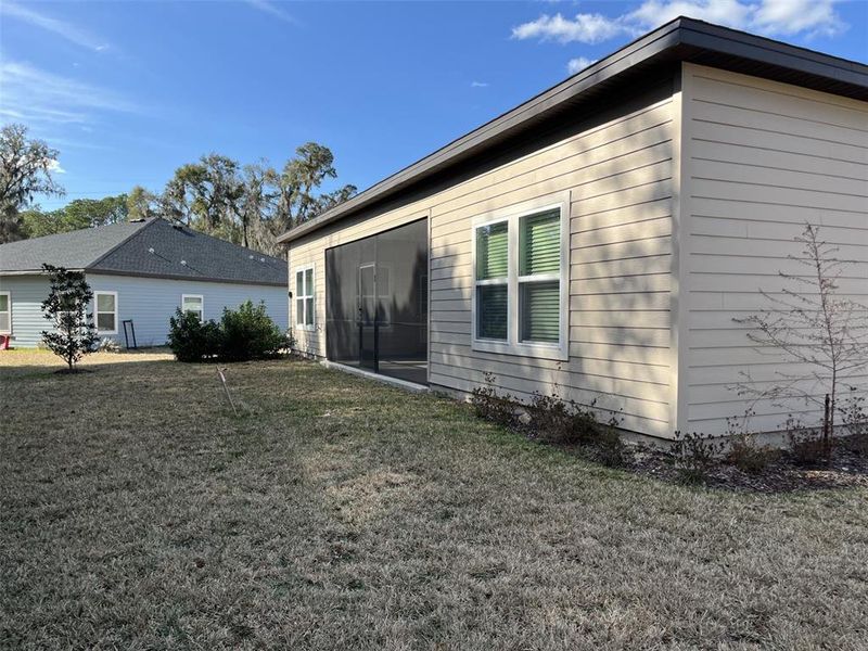 Exterior details and patio area of a home in Grand Park North, Dunnellon (Image 22).