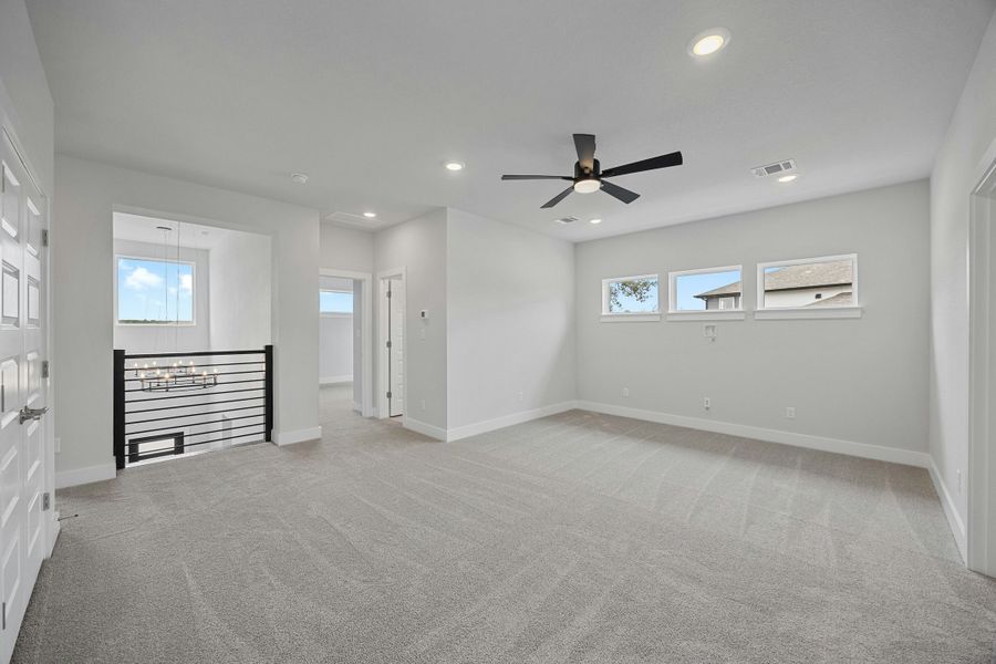Spacious, unfurnished interior of a new home in Caliterra, Dripping Springs (Image 29).