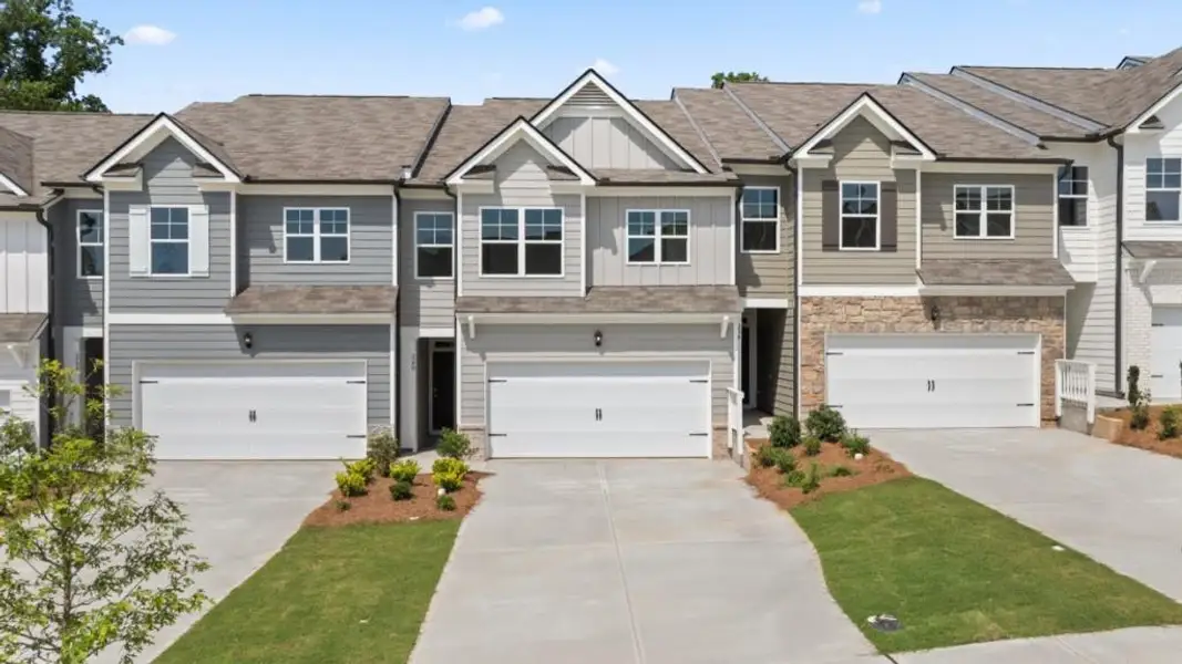 Front exterior of a new home in Rolling Meadows, Jasper, GA, highlighting curb appeal (Image 1). Front exterior of a new home in Rolling Meadows, Jasper, GA, highlighting curb appeal (Image 1).