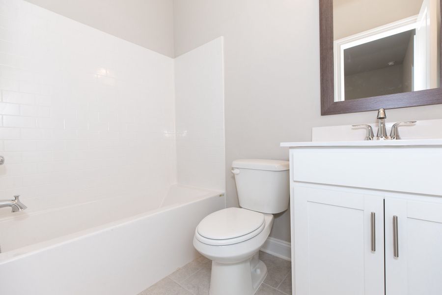 Representative furnished interior of a home built from the The Charleston by The Providence Group in Aberdeen, Hoschton (Image 19).
