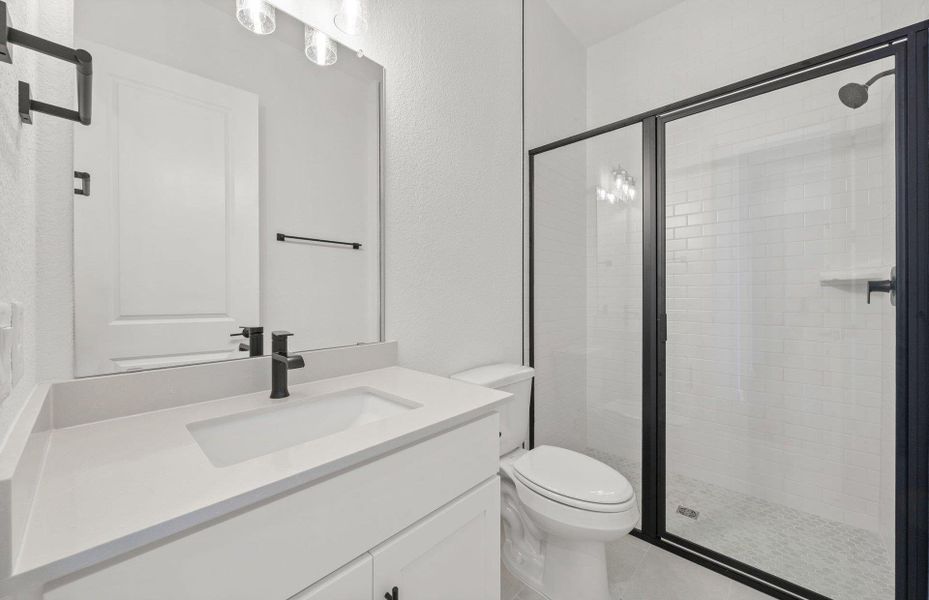 Furnished interior view inside a new home in 6 Creeks, Kyle (Image 5).