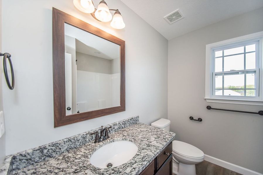Representative furnished interior of a home built from the Archer by Enchanted Homes in Ballentine Ridge, Lyman (Image 12).