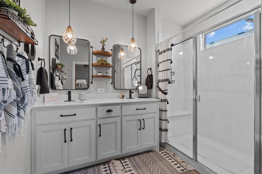 Bathroom with vanity and walk in shower