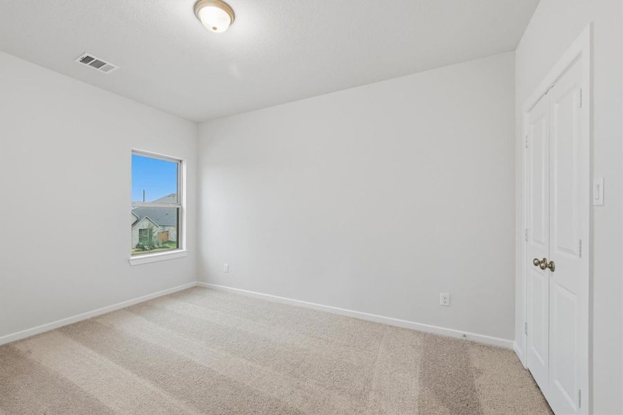 Spacious, unfurnished interior of a new home in Canterra Creek  60', Iowa Colony (Image 35).