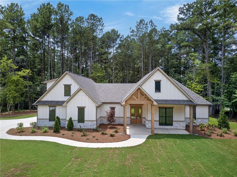 Front exterior of a new home in , Buchanan, GA, highlighting curb appeal (Image 27).