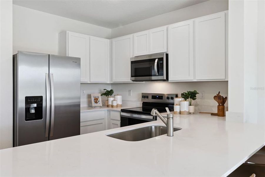 Furnished interior view inside a new home in Danbury at Ridgewood Lakes, Davenport (Image 14). Furnished interior view inside a new home in Danbury at Ridgewood Lakes, Davenport (Image 14).