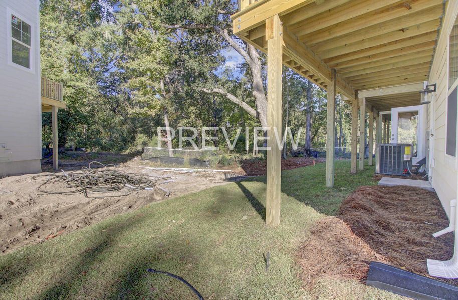 Exterior details and patio area of a home in , Johns Island (Image 20).