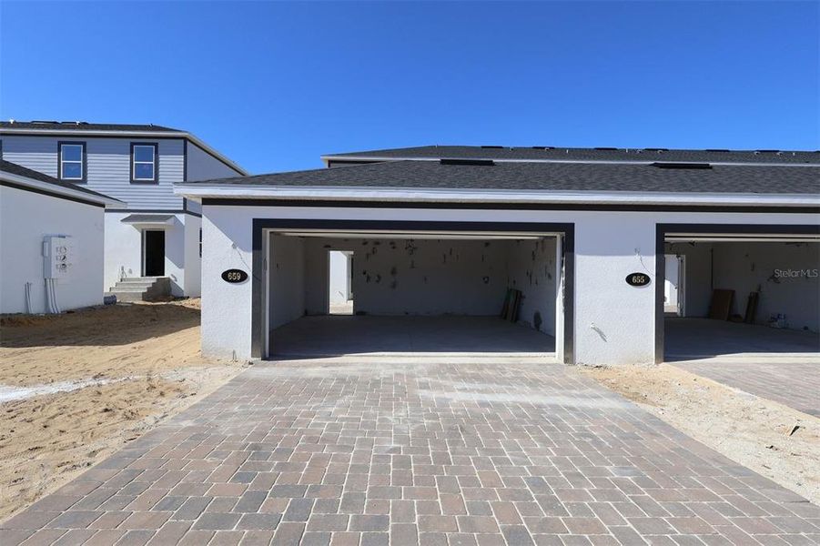 Exterior details and patio area of a home in Emerson Pointe, Apopka (Image 3).