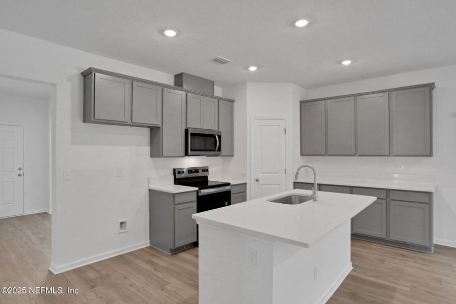 Furnished interior view inside a new home in Bellbrooke, Jacksonville (Image 12). Furnished interior view inside a new home in Bellbrooke, Jacksonville (Image 12).