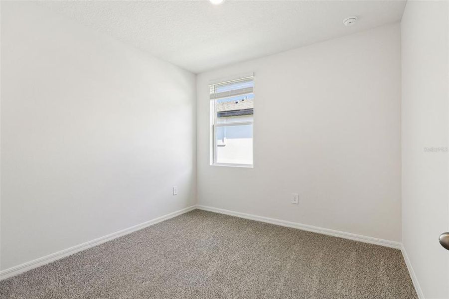 Spacious, unfurnished interior of a new home in Springs at Lake Alfred - Classic Series, Lake Alfred (Image 27).