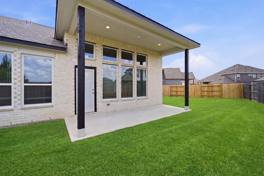 Exterior details and patio area of a home in Sunterra, Katy (Image 21). Exterior details and patio area of a home in Sunterra, Katy (Image 21).