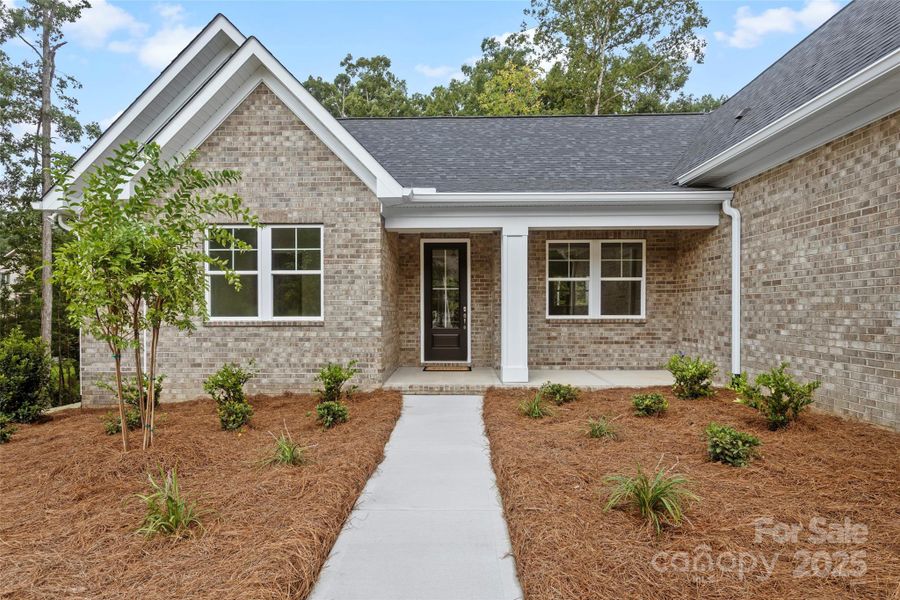 Front exterior of a new home in , Lancaster, SC, highlighting curb appeal (Image 18).