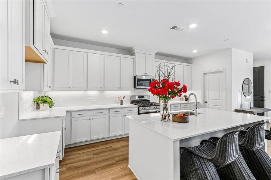 The spacious island is the hub of this fantastic home! The spacious island is the hub of this fantastic home!