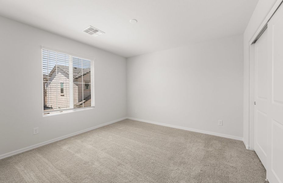 Spacious, unfurnished interior of a new home in Asante- Atrium Series, Surprise (Image 23).