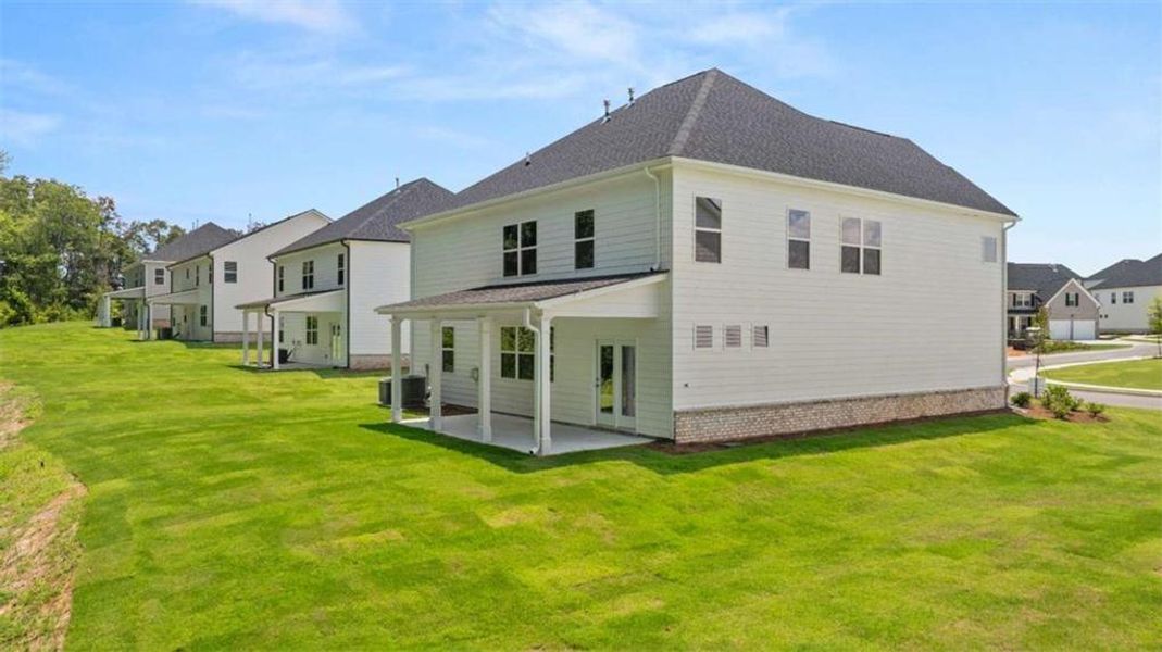 Exterior details and patio area of a home in Independence, Loganville (Image 3).