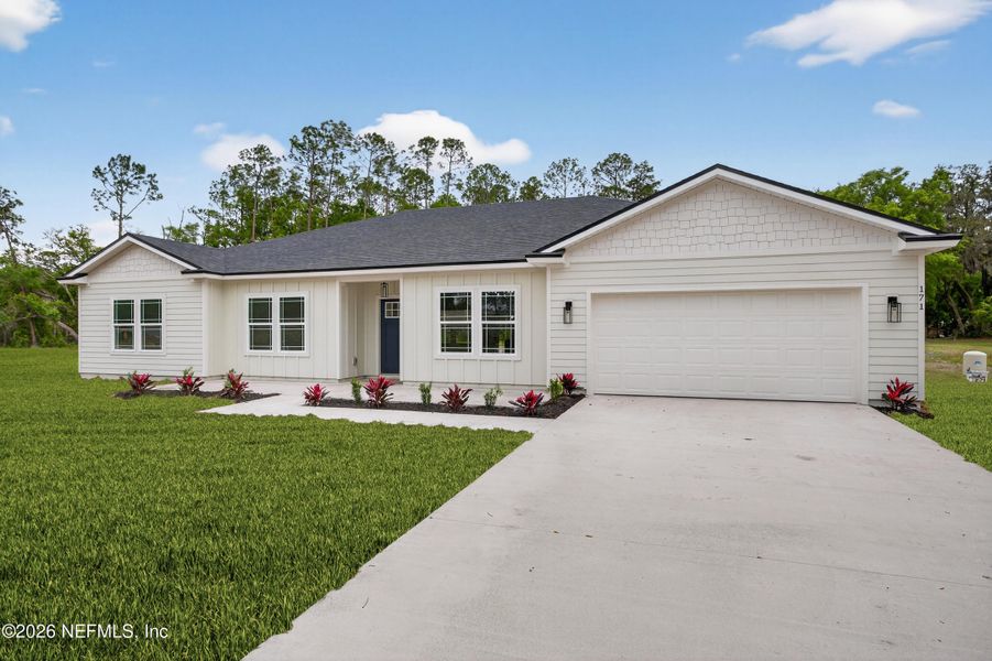 Front exterior of a new home in , Middleburg, FL, highlighting curb appeal (Image 2). Front exterior of a new home in , Middleburg, FL, highlighting curb appeal (Image 2).