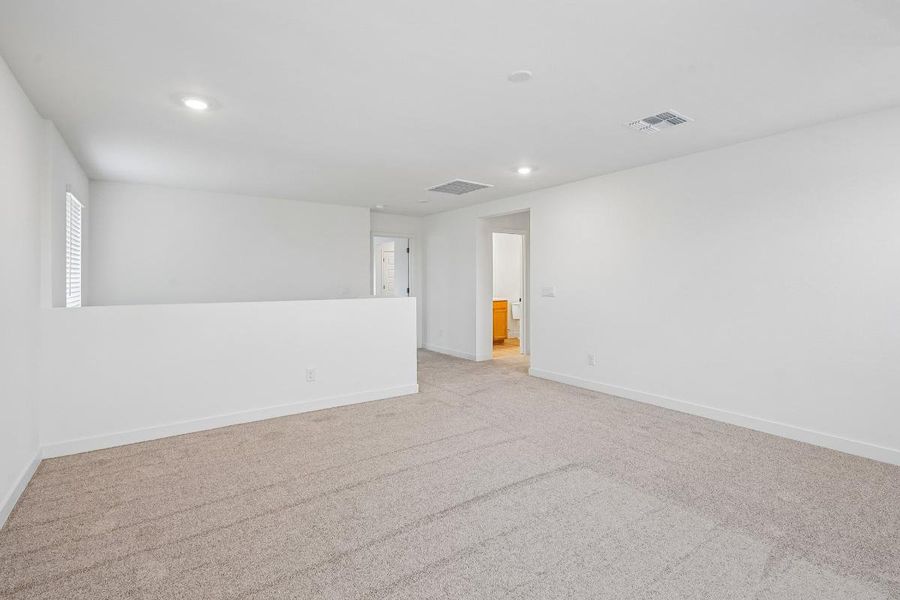 Spacious, unfurnished interior of a new home in The Enclaves at Sonrisa, Queen Creek (Image 8).