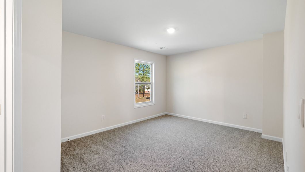 Representative unfurnished interior of a home built from the LONDON by D.R. Horton in Adams Glen, Greenville (Image 33).