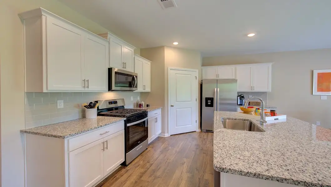 Furnished interior view inside a new home in Tap Root Farms, Fletcher (Image 7). Furnished interior view inside a new home in Tap Root Farms, Fletcher (Image 7).