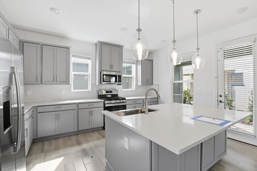Representative furnished interior of a home built from the Ashwood by Taylor Morrison in Harvest at Ovation, Winter Garden (Image 9).