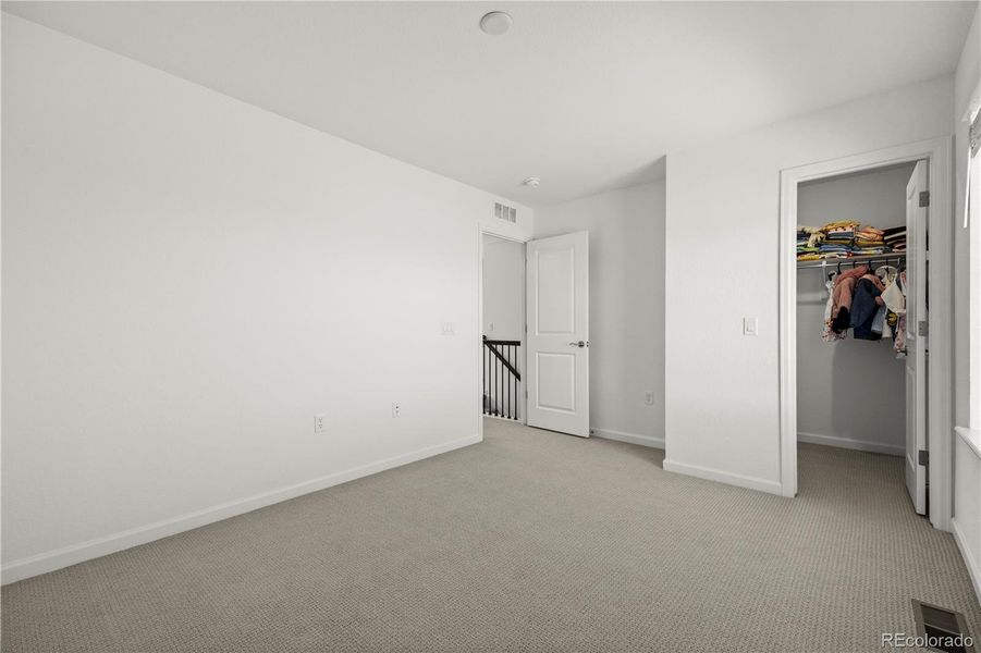 Spacious, unfurnished interior of a new home in Anthology North, Parker (Image 24).