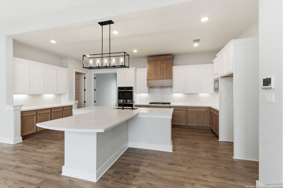 Furnished interior view inside a new home in Potranco Oaks, Castroville (Image 6).