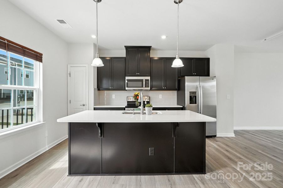 Furnished interior view inside a new home in , Matthews (Image 6).