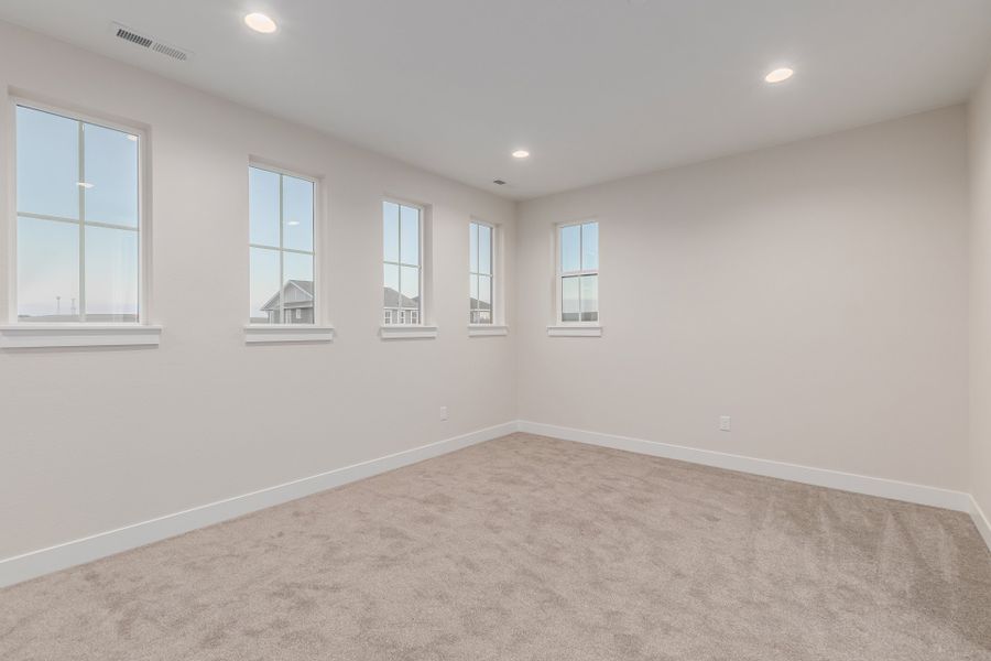 Representative unfurnished interior of a home built from the Luxe by Scott Felder Homes in Westerly, Erie (Image 49).