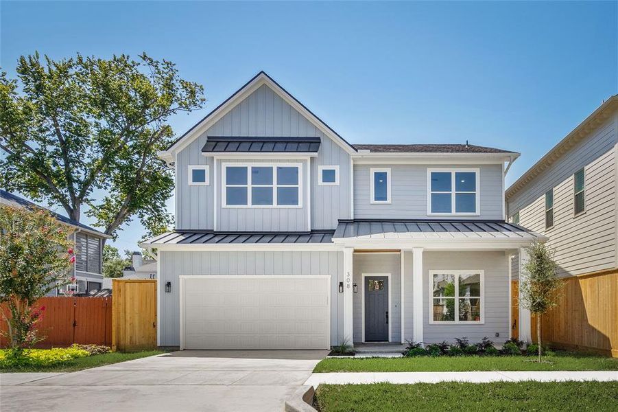 Here is a photo of the front of the home. The front porch is deep enough for patio furniture if you so choose, but let's take a look inside!