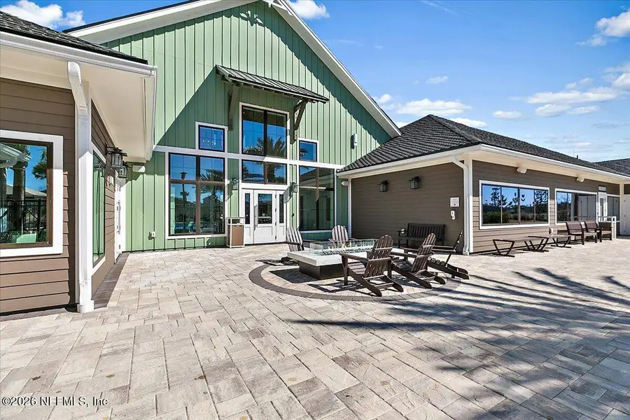 Exterior details and patio area of a home in Edenbrooke at Hyland Trail | 55+, Green Cove Springs (Image 4).