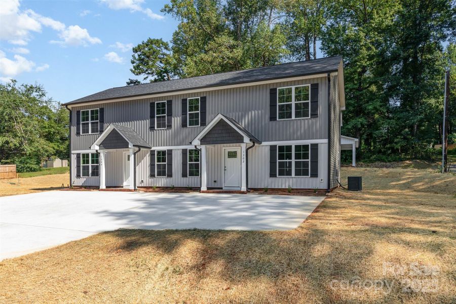Front exterior of a new home in , Kannapolis, NC, highlighting curb appeal (Image 18).