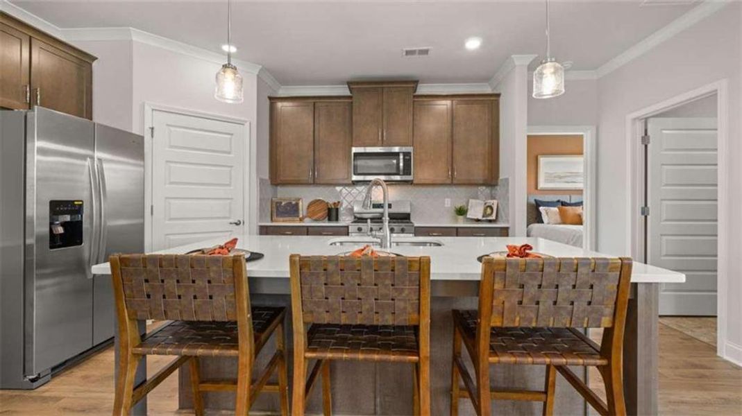 Furnished interior view inside a new home in Oak Ridge Meadows - Active Adult, Locust Grove (Image 13).