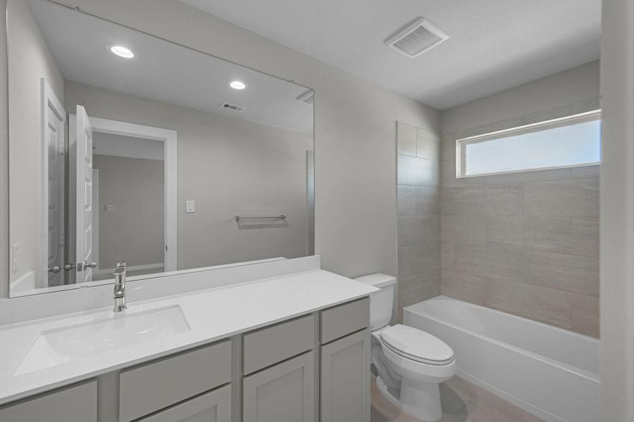 Furnished interior view inside a new home in Sunterra Lakes, Brookshire (Image 13).