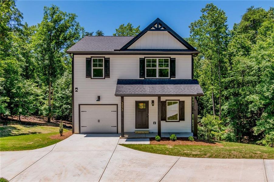 Front exterior of a new home in , Gainesville, GA, highlighting curb appeal (Image 1). Front exterior of a new home in , Gainesville, GA, highlighting curb appeal (Image 1).