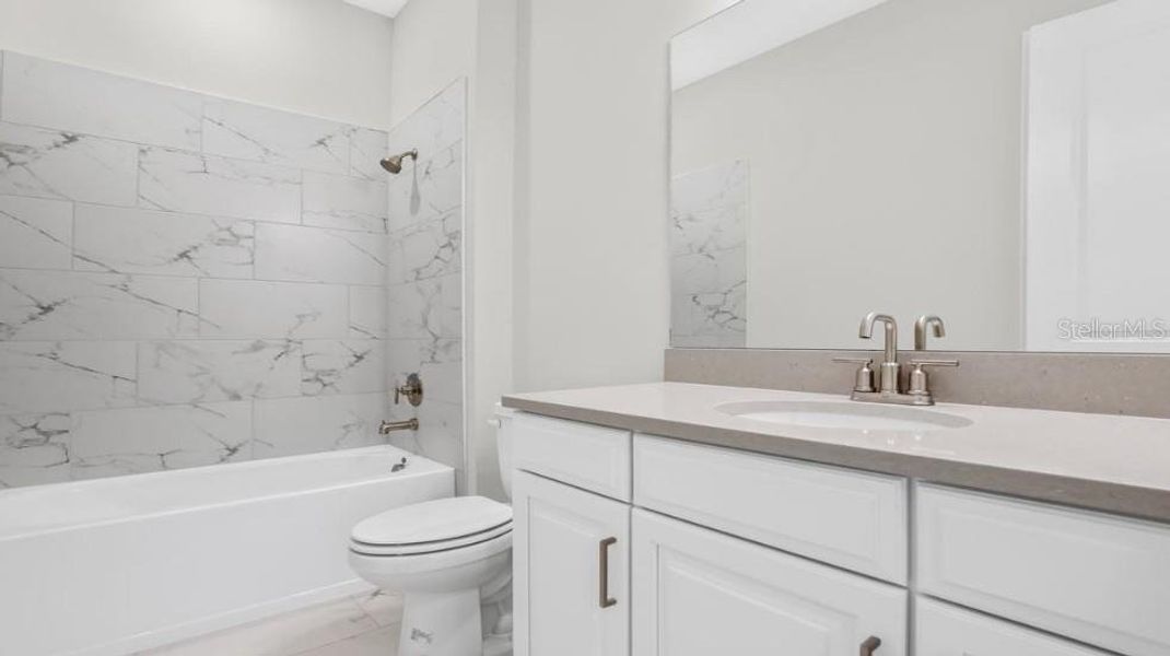 Furnished interior view inside a new home in Esplanade at Starling, Punta Gorda (Image 7). Furnished interior view inside a new home in Esplanade at Starling, Punta Gorda (Image 7).