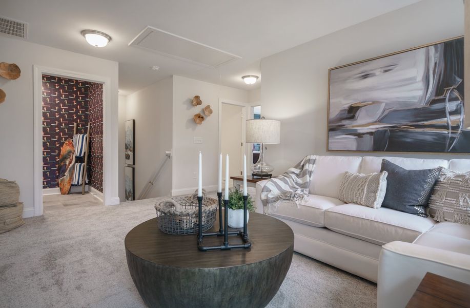 Representative furnished interior of a home built from the The Kensington A by Cothran Homes in Reidville Town Center, Reidville (Image 32).