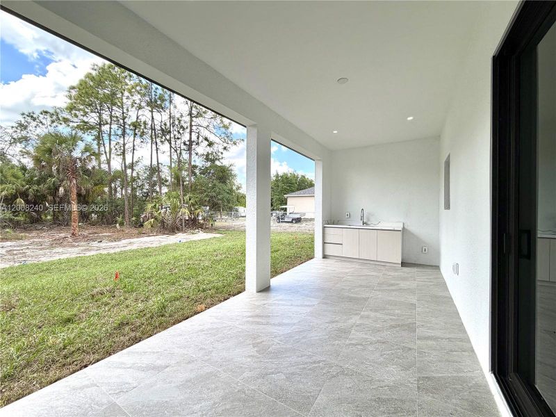 Exterior details and patio area of a home in , Naples (Image 3).