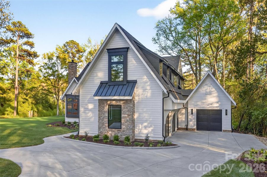 Front exterior of a new home in , Charlotte, NC, highlighting curb appeal (Image 27).